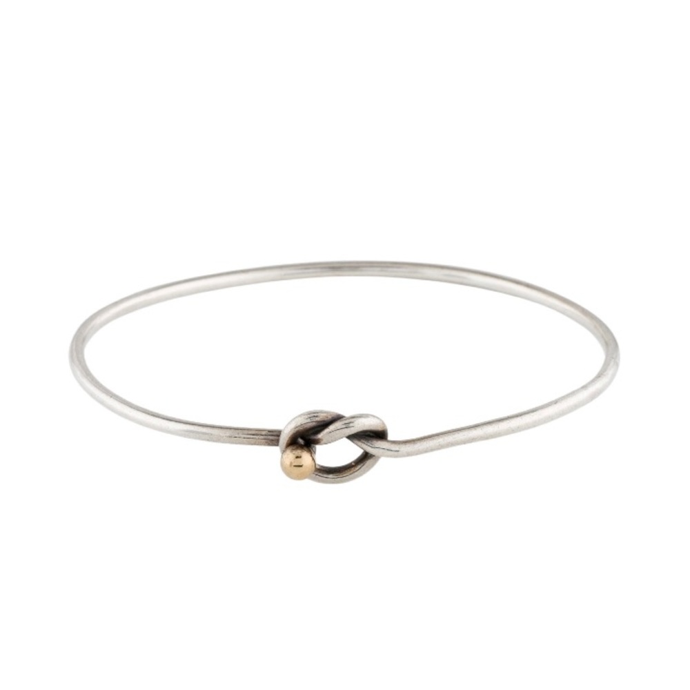 Authentic Tiffany & Co.  silver and gold bangle. lucky in love knot.
